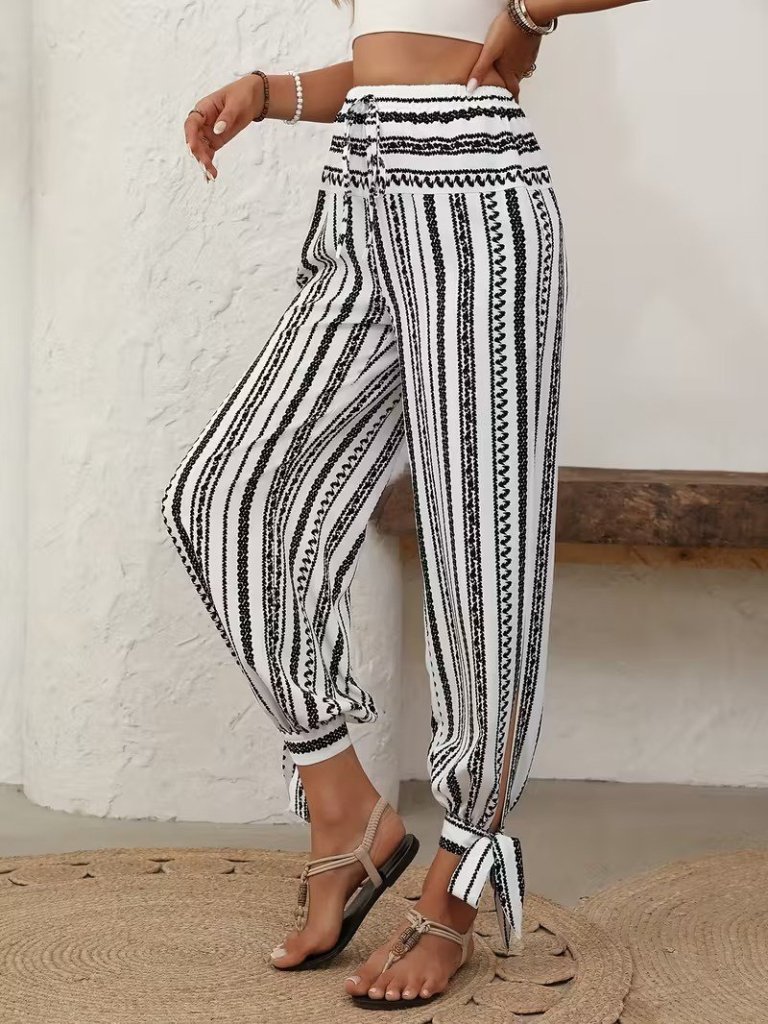 Kadın Yüksek Bel Desenli Paçadan Bağlamalı Yanları Yırtmaçlı Süprem Pantolon Kadın Yüksek Bel Desenli Paçadan Bağlamalı Yanları Yırtmaçlı Süprem Pantolon