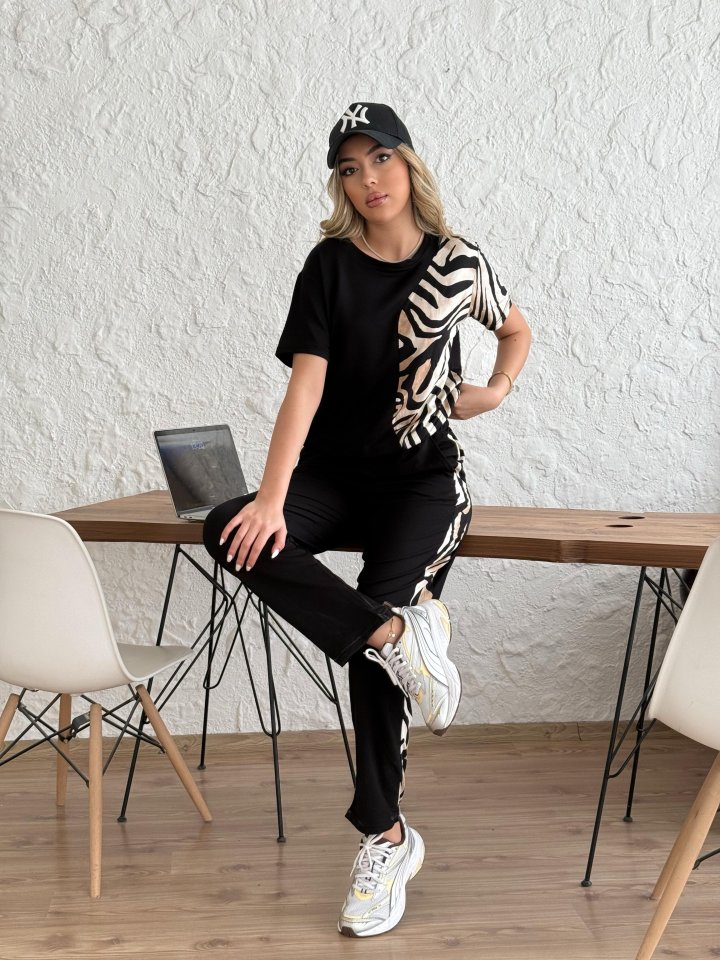 Kadın Bisiklet Yaka Kısa Kol Leopar Desen Bluz Ve Pantolon Ikili Takım Kadın Bisiklet Yaka Kısa Kol Leopar Desen Bluz Ve Pantolon Ikili Takım